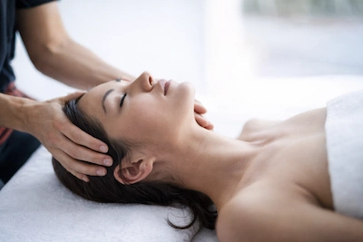 Manual therapy for headache and TMJ pain relief in Coquitlam clinic