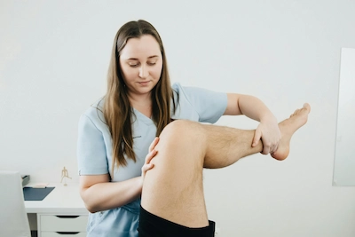 Hands-on manual therapy for knee sports injury rehabilitation in Coquitlam